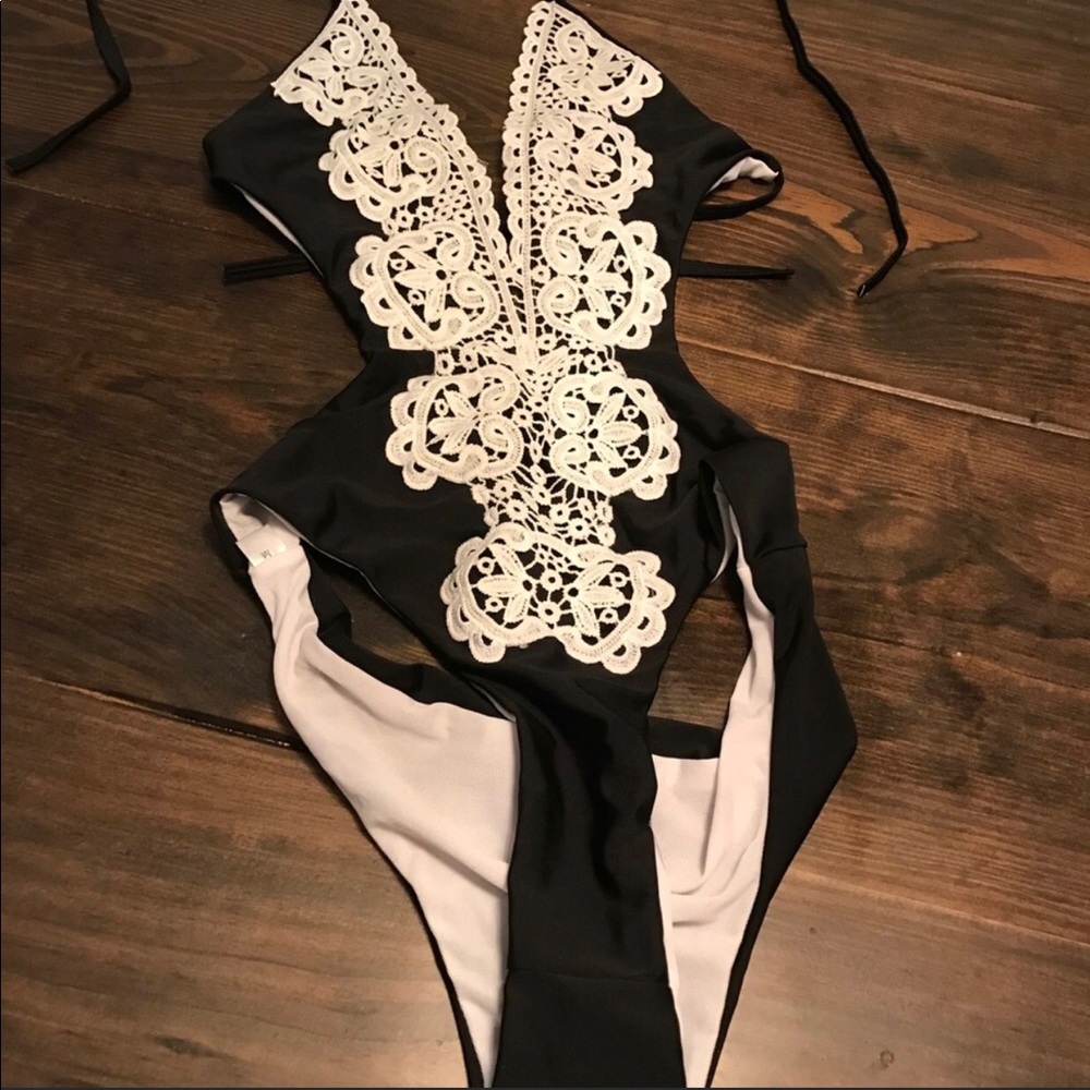 Classy one piece  swim suit never worn.
